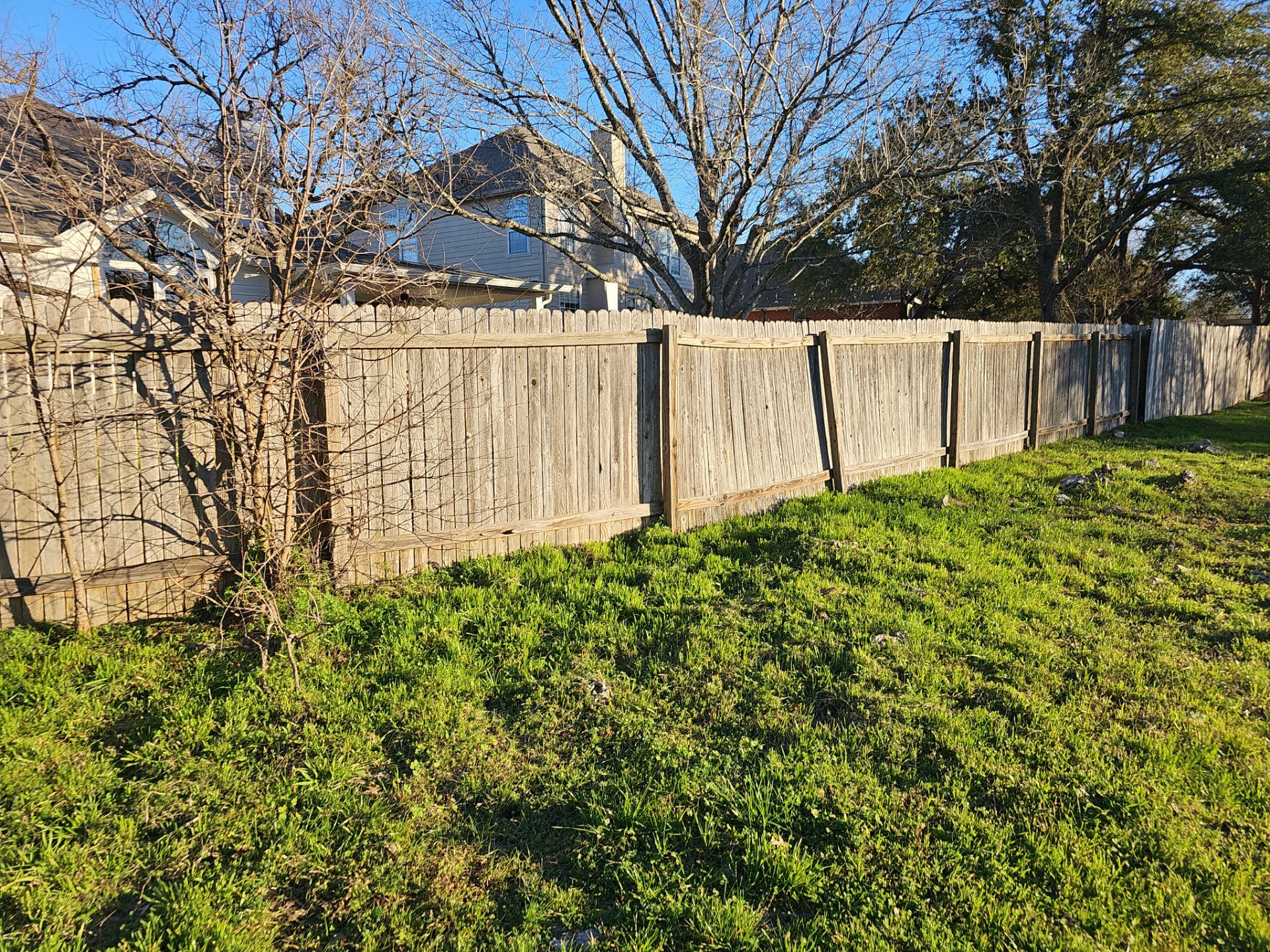 Fence Installation using Cedar Pickets by DeZign Roofing & Exteriors