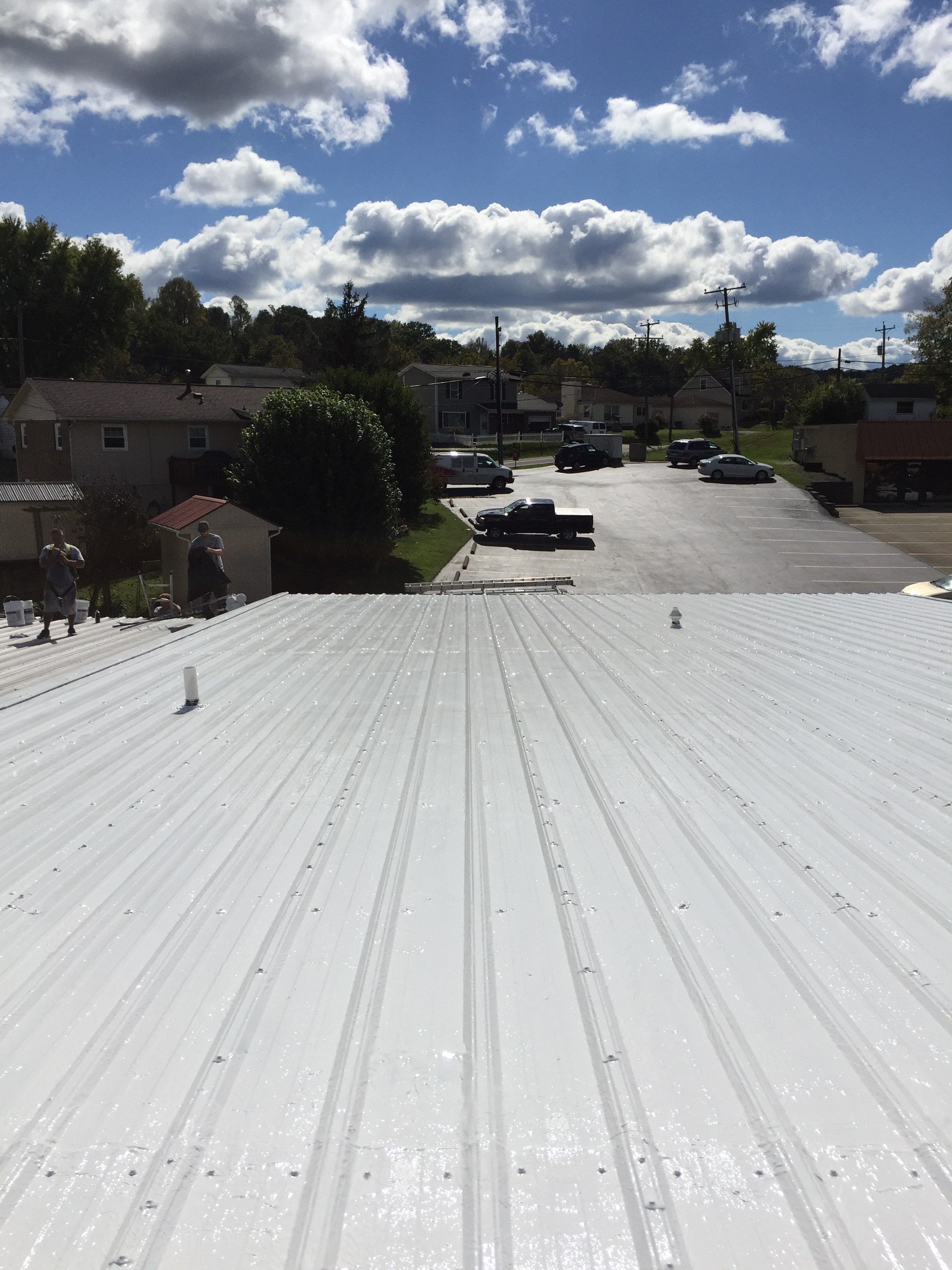 Commercial Roof Coating using Gaco Silicone Roof Coating by Secure Construction Company Inc