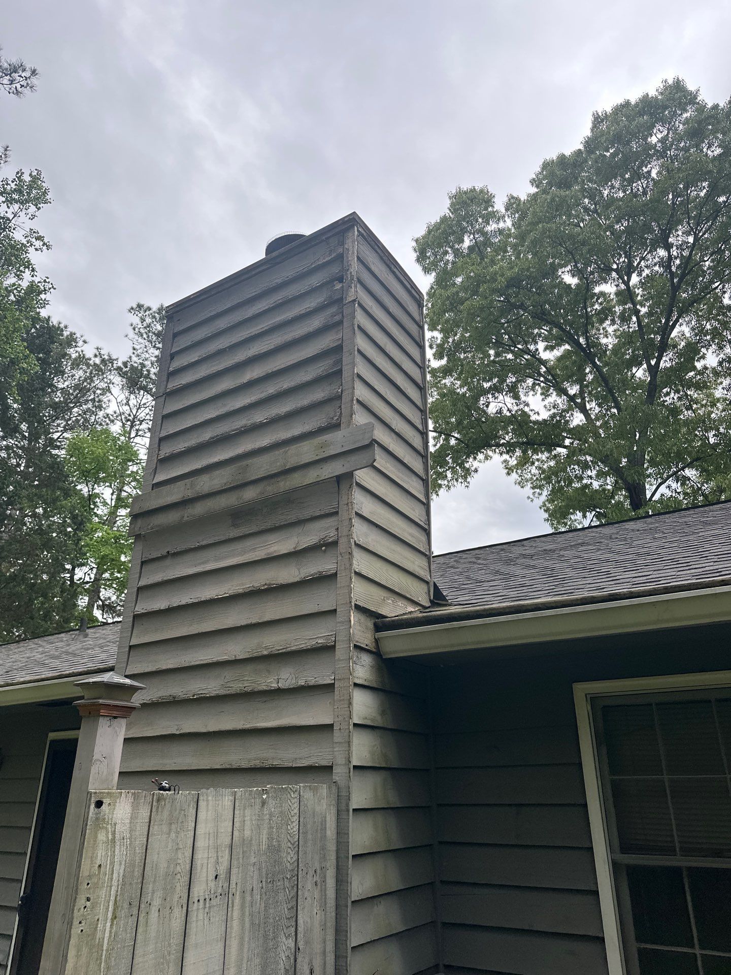 Marietta, GA Exterior Painting Transformation with Blue Paint by Nelson Exteriors