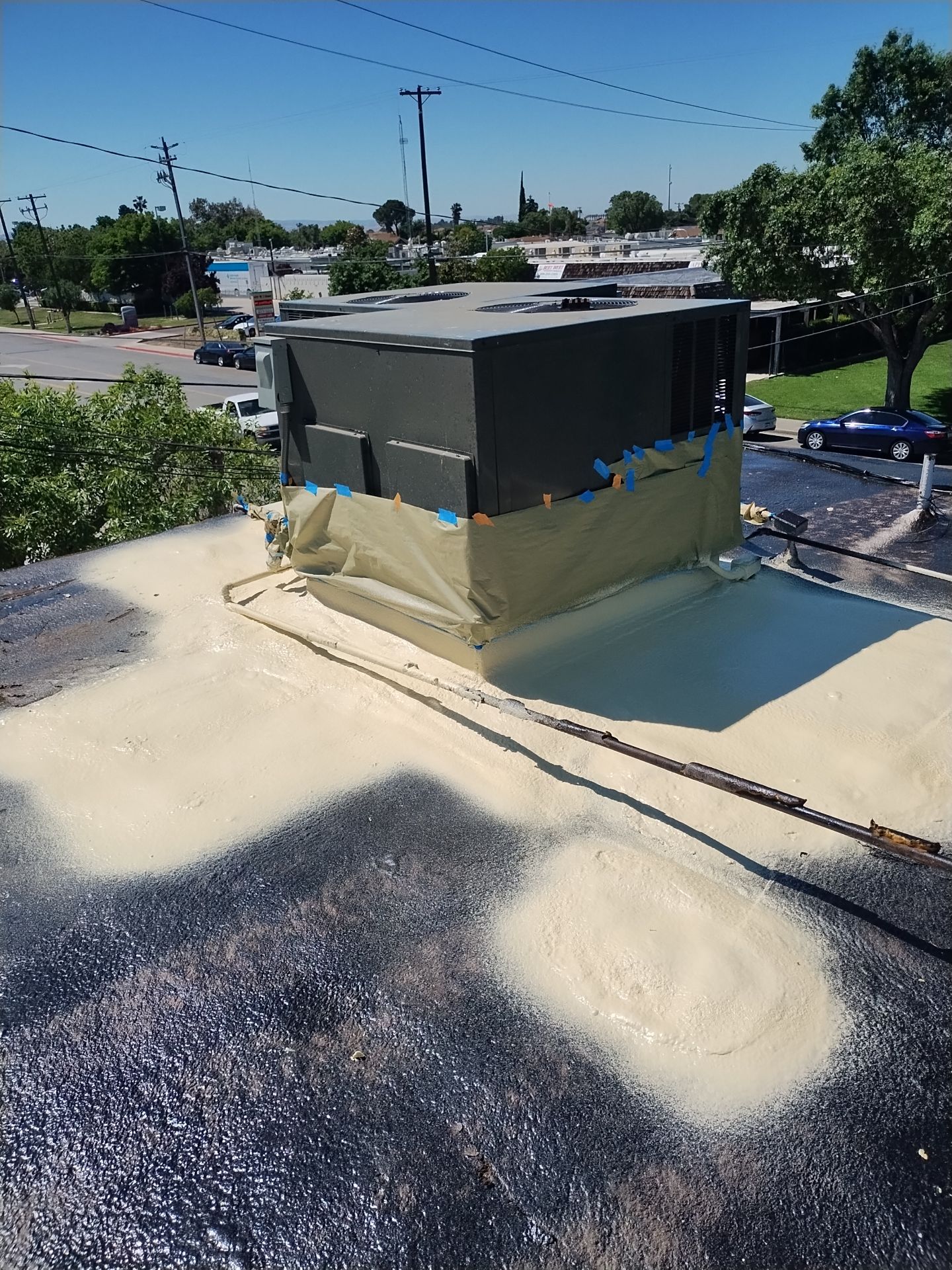 Foam Refurbish using General Coatings acrylic coatings and spray foam by Straight Edge Roofing Inc