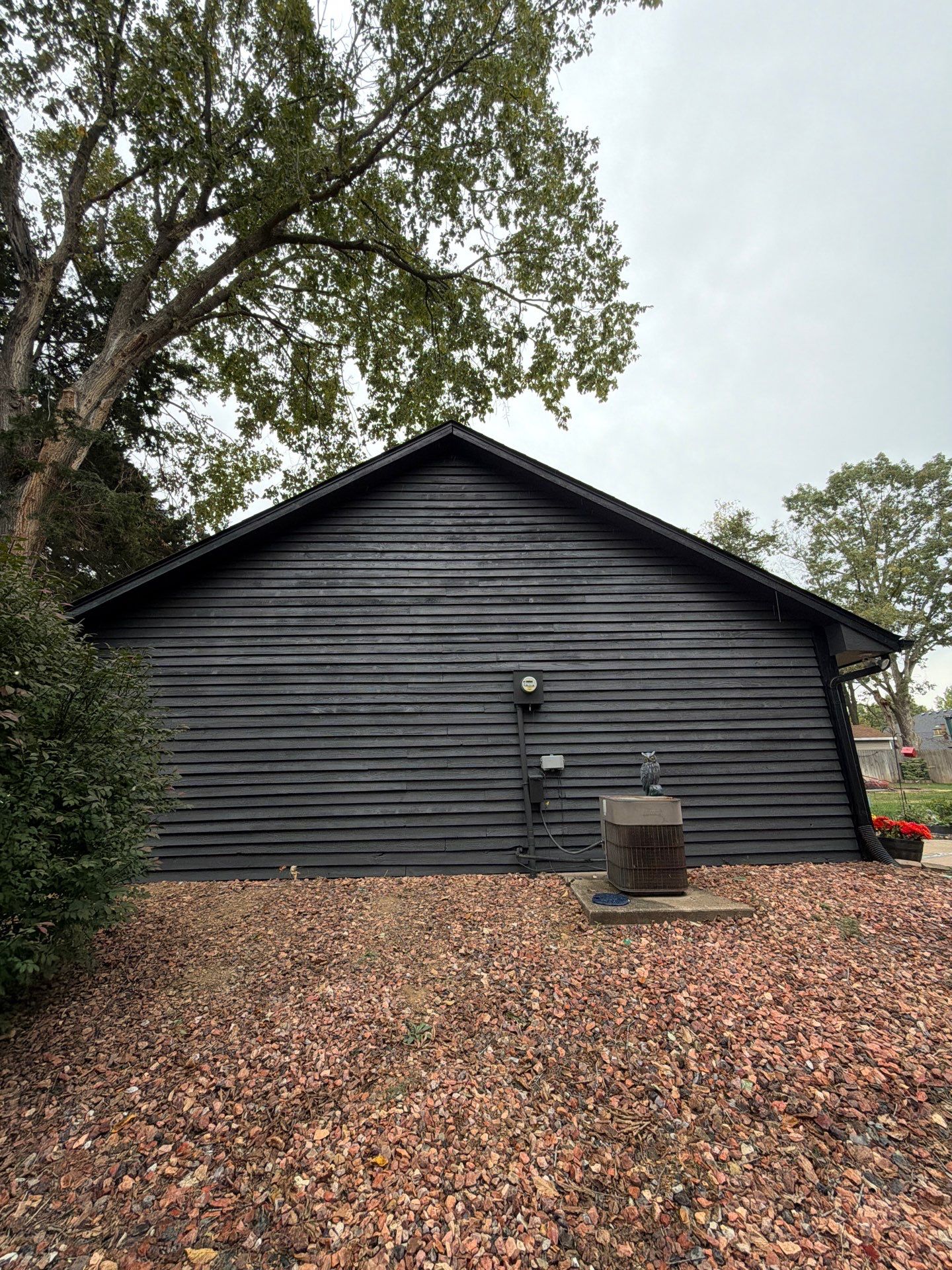 Wood siding refresh by Pezley Painting