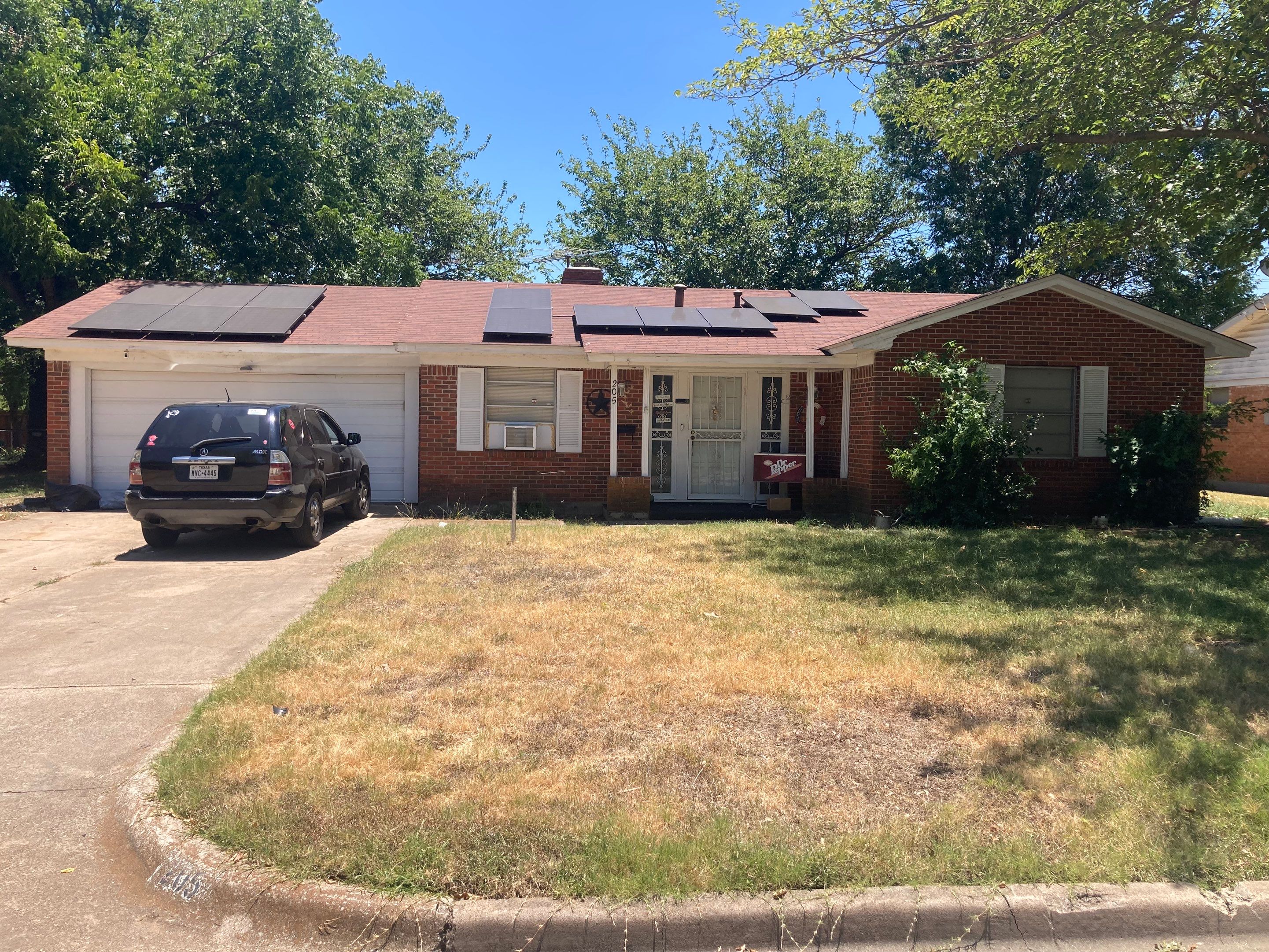 Estate Gray Shingles by Reimagine Roofing