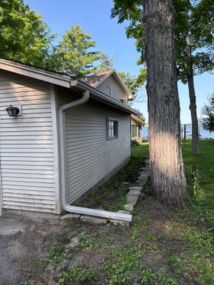 Residential Gutter System and Downspout Extension Installation in Traverse City