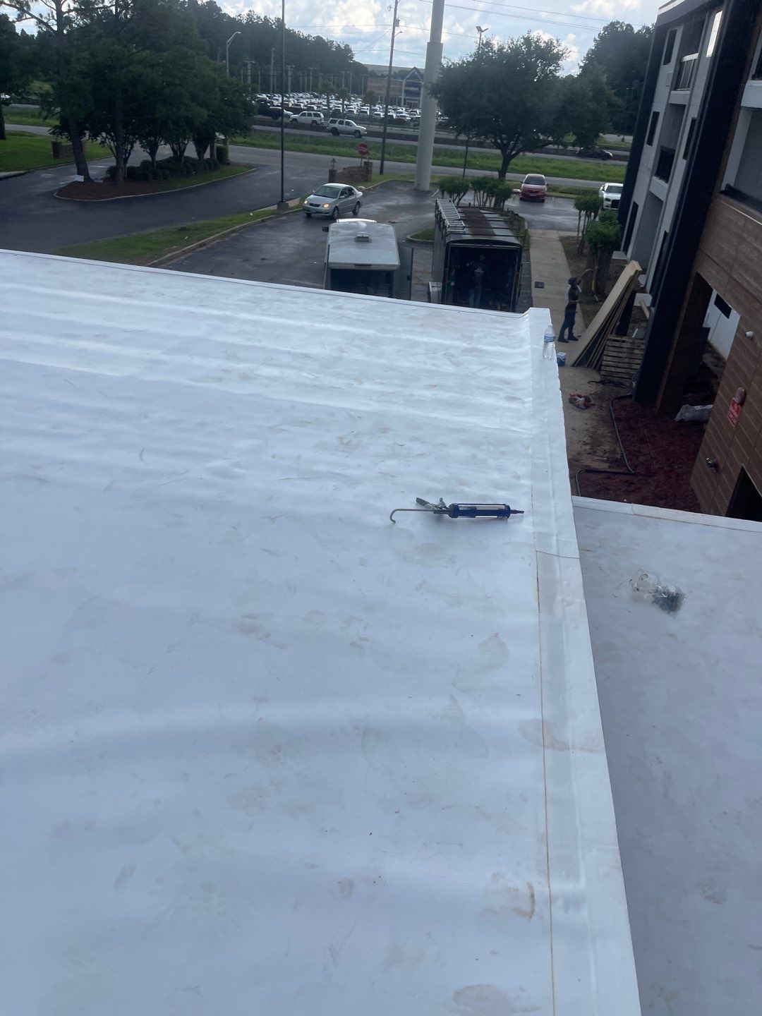 Commercial Roofing Installation using Roof Replacement by American Roofing & Construction LLC