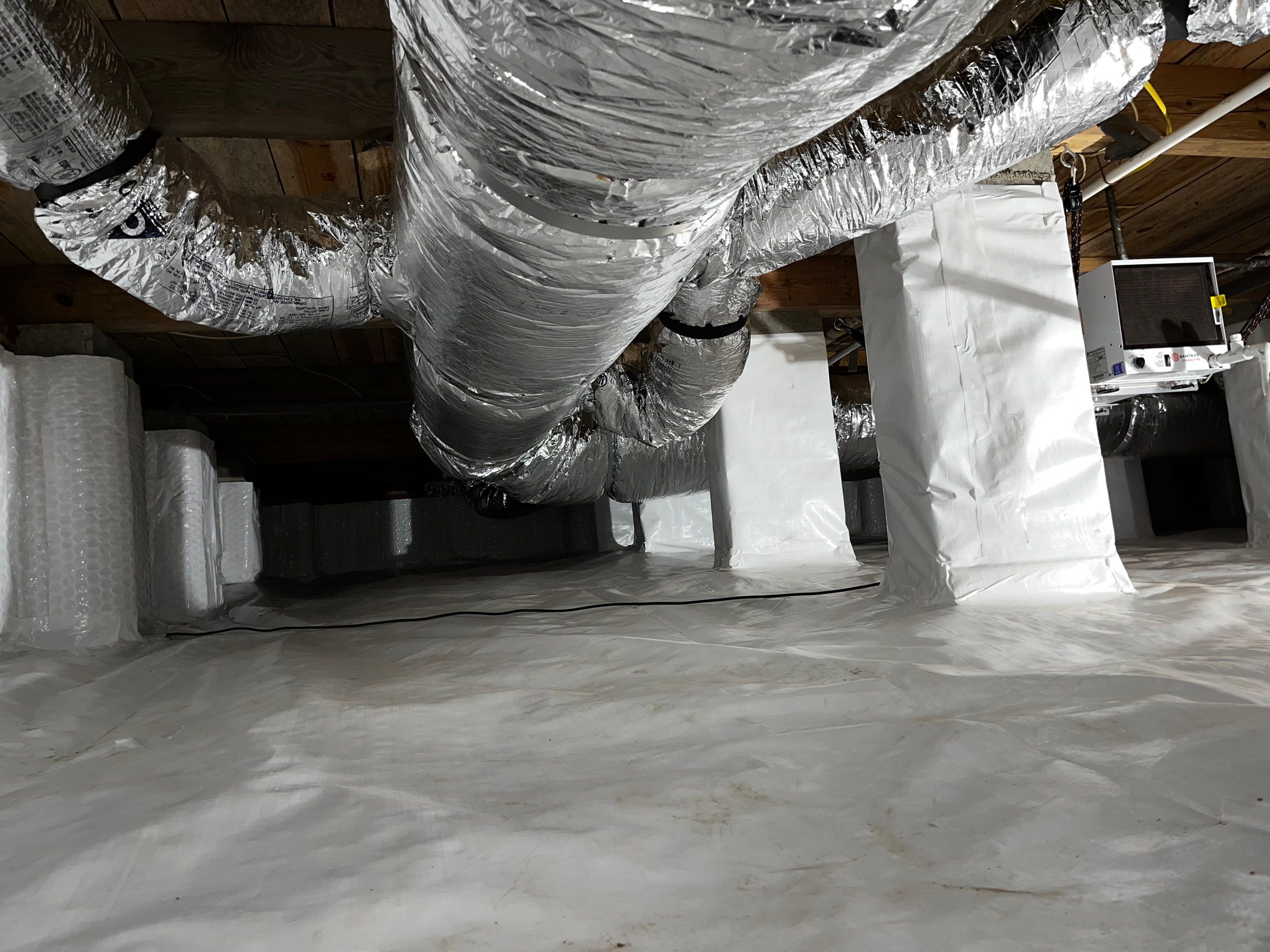 Impact Choice Encapsulation with new piers and crawlspace door. by Impact Crawlspace