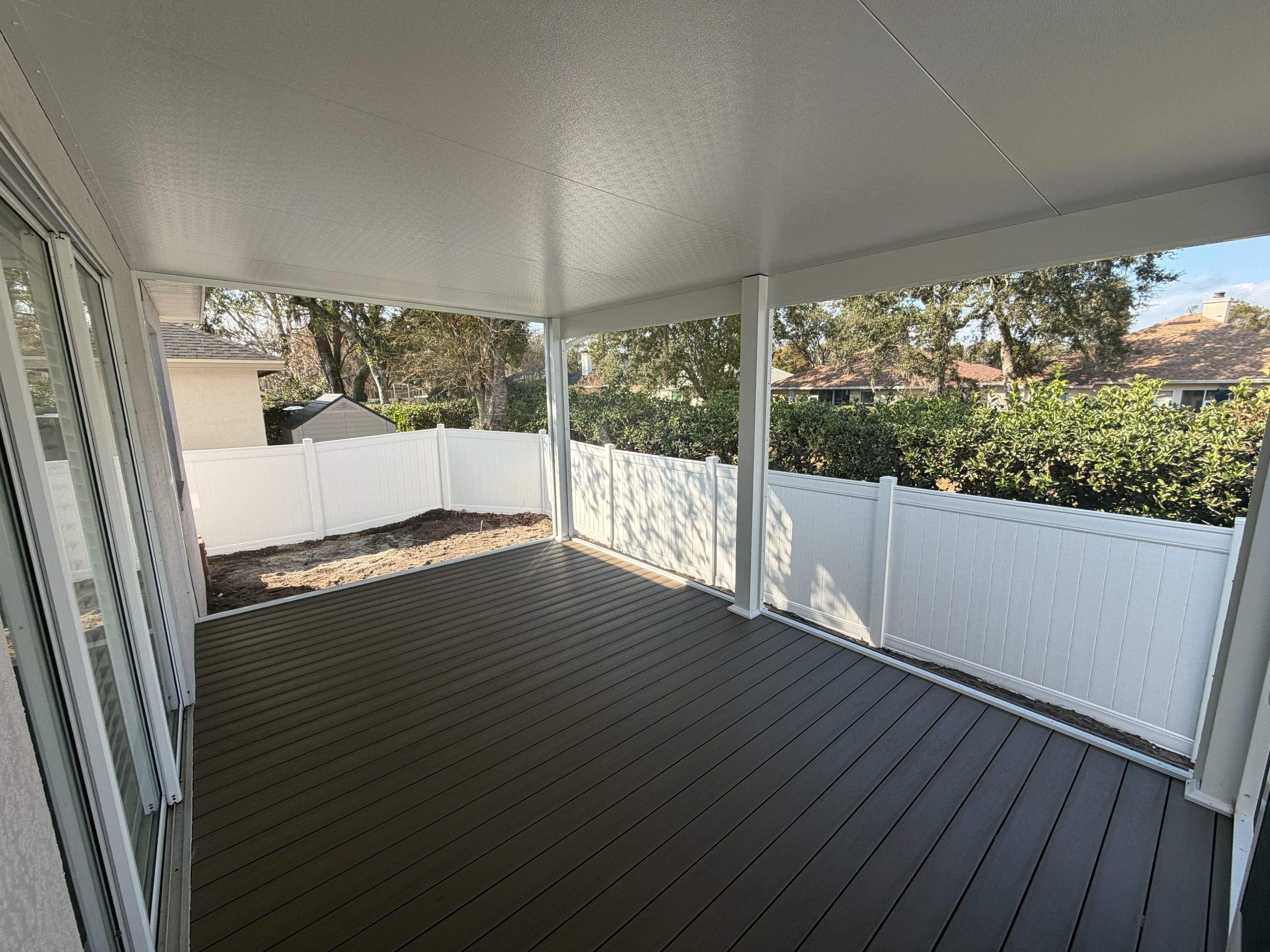 The Complete Backyard Retreat: Insulated Screen Room & Composite Deck by Orlando pergolas