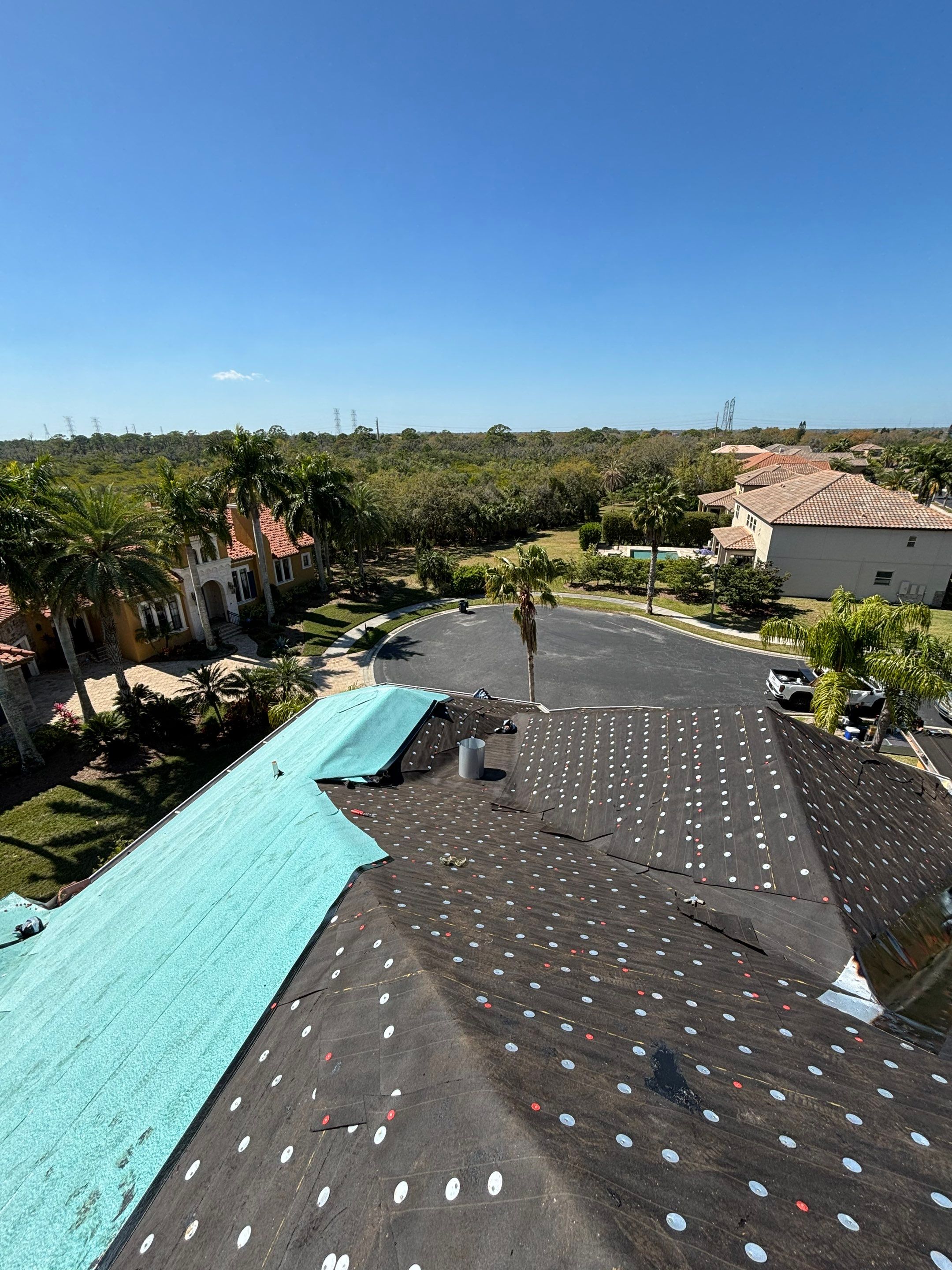 Dark Bronze Standing Seam by Reimagine Roofing