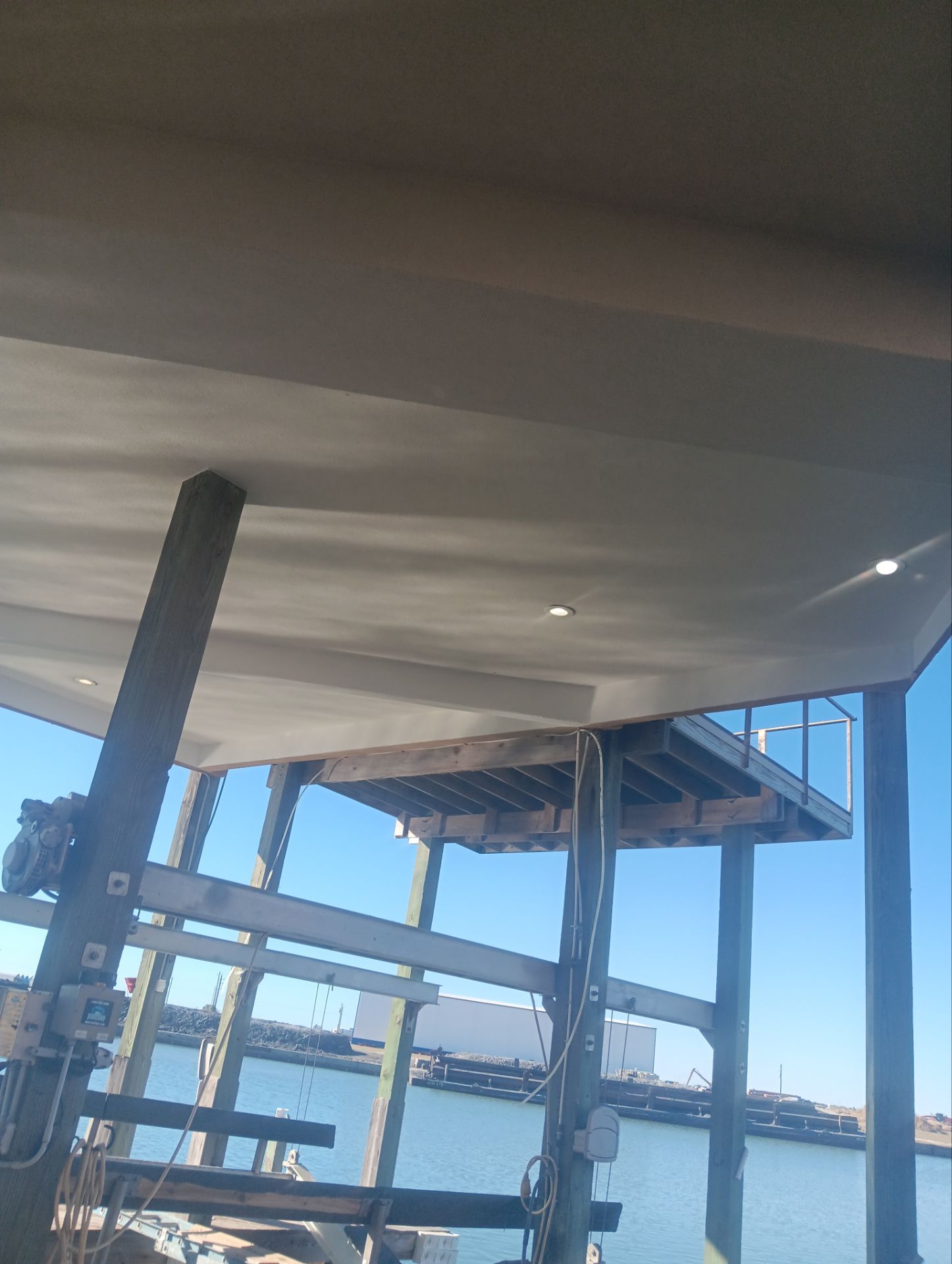Waterfront Walkout Waterproofed! by Bayfront Roofing and Construction