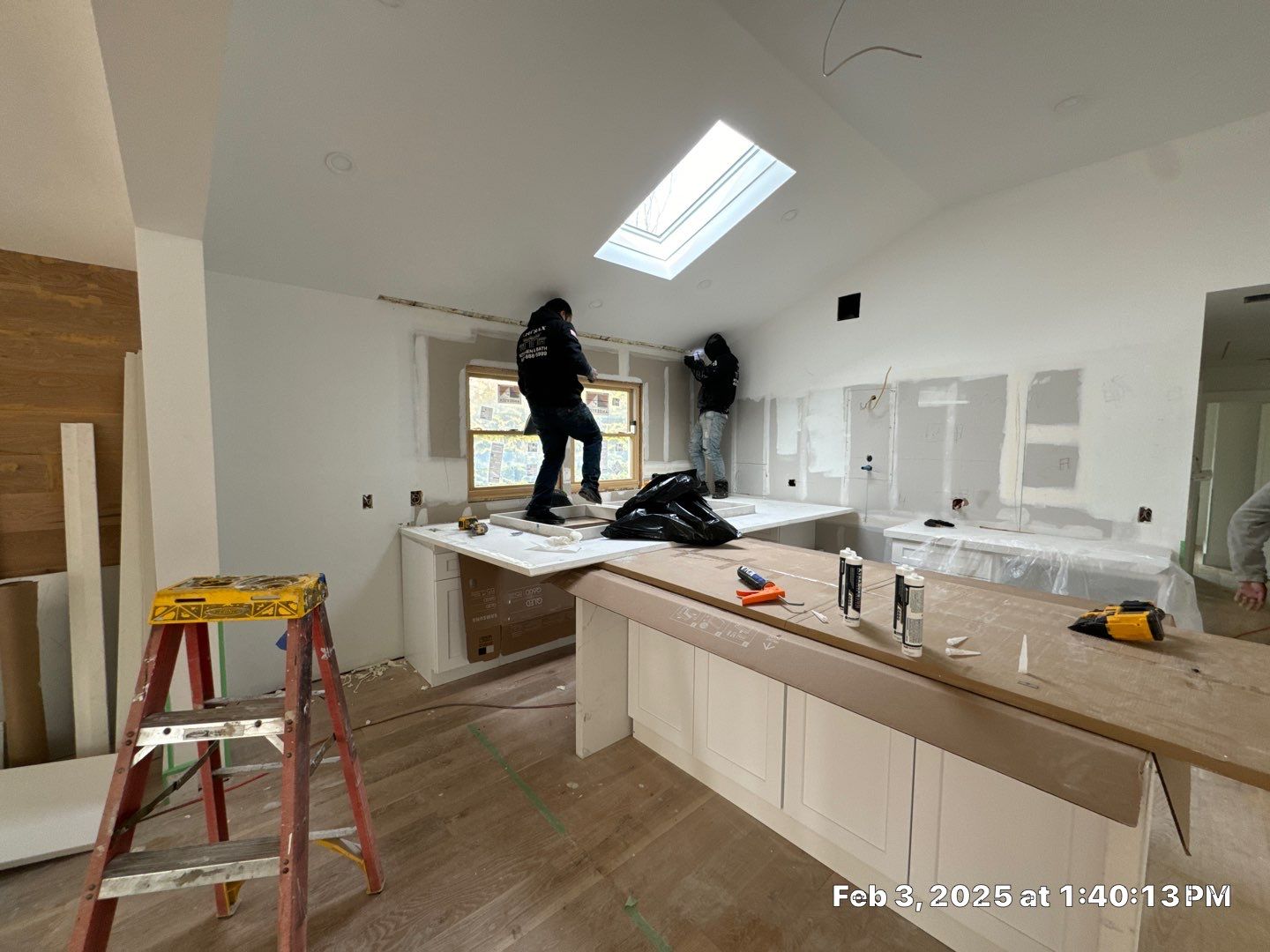 Cabinet Installation using white shaker  by Antrax Corp