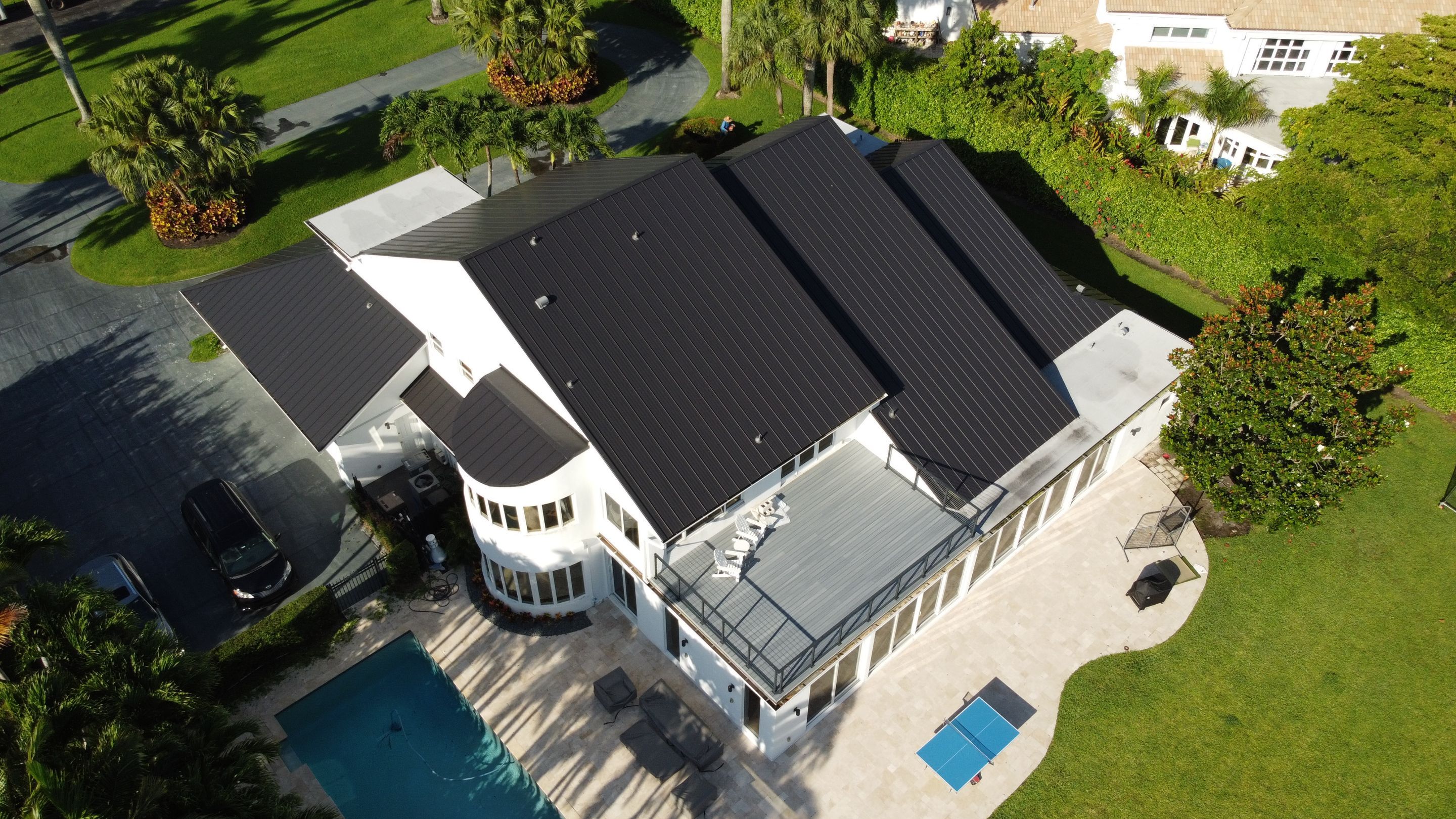 Residential Roofing Installation using 1" Nail strip metal roof by BLUES BROTHERS CONSTRUCTION CORP