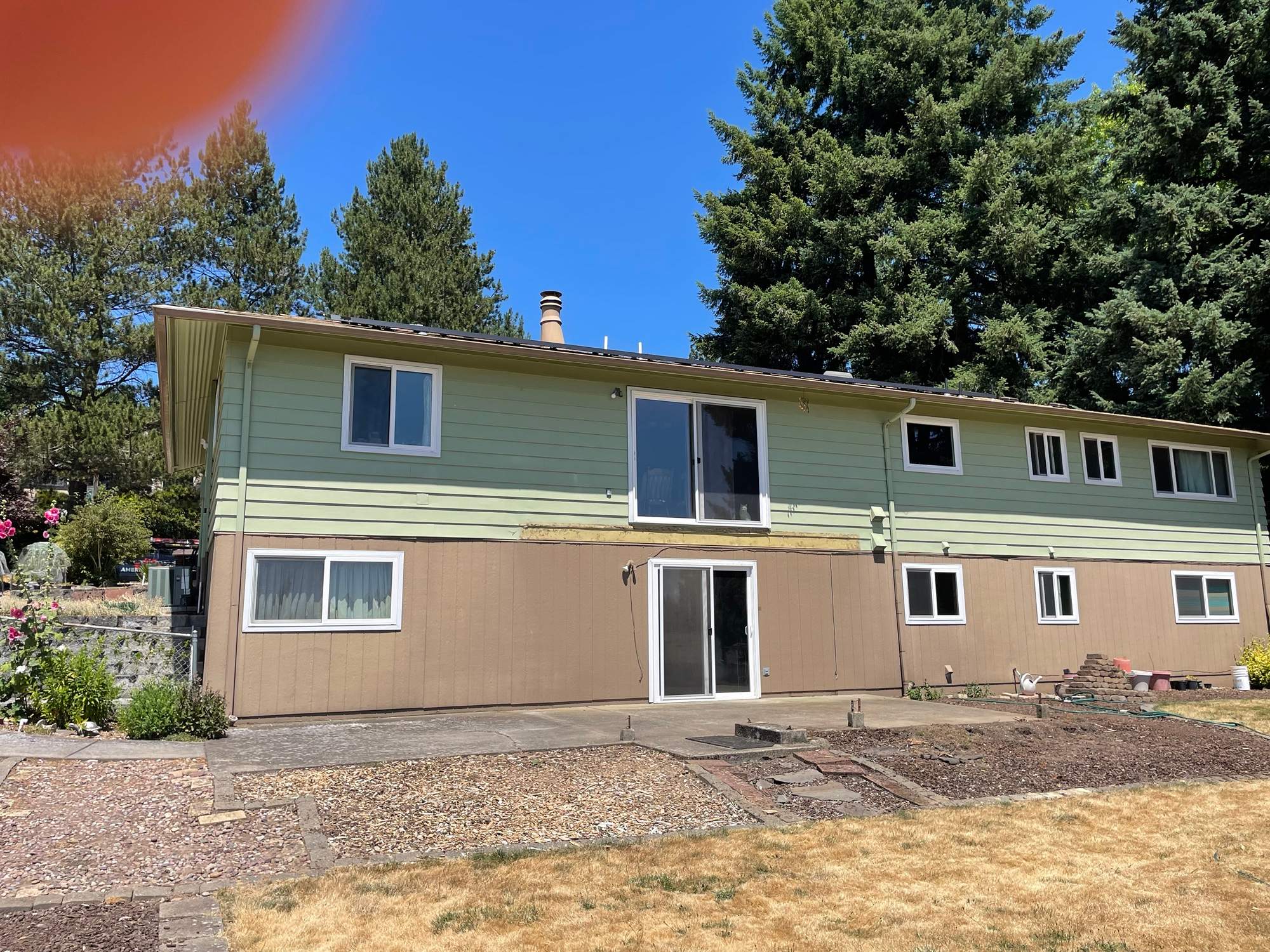 Tigard Exterior Renovation Featuring Composite Deck and Custom Catio by American Made Construction
