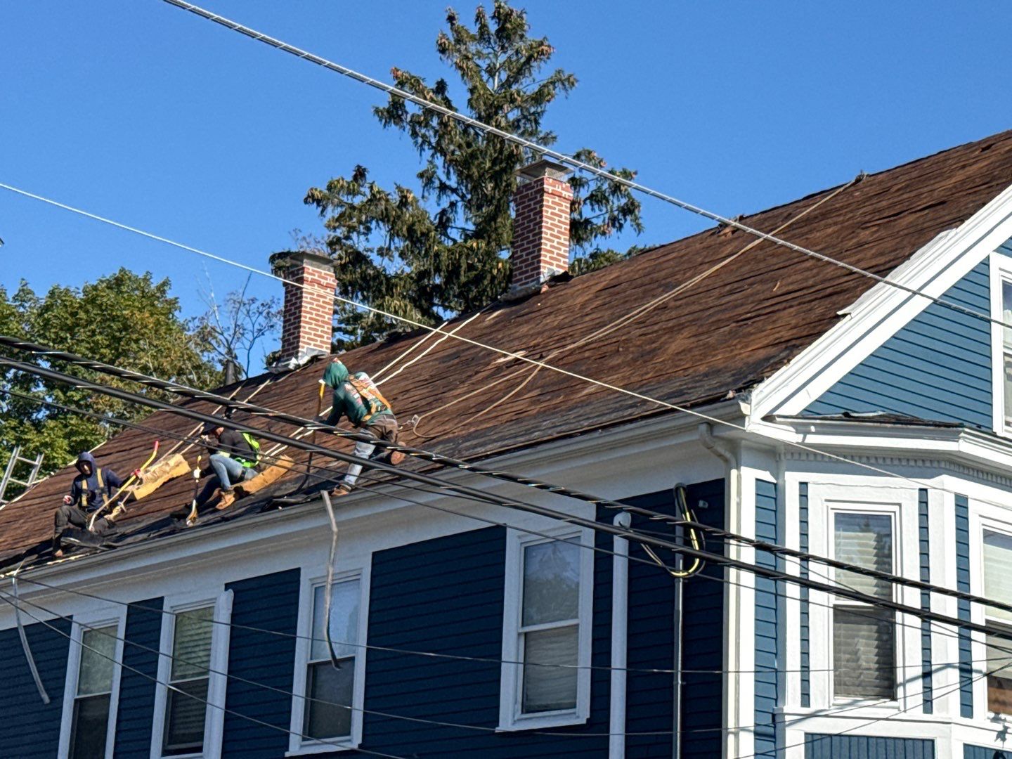 Half Roof Replacement for Solar Installation – Townhouse with New Plywood Decking by Sensible Home Solutions