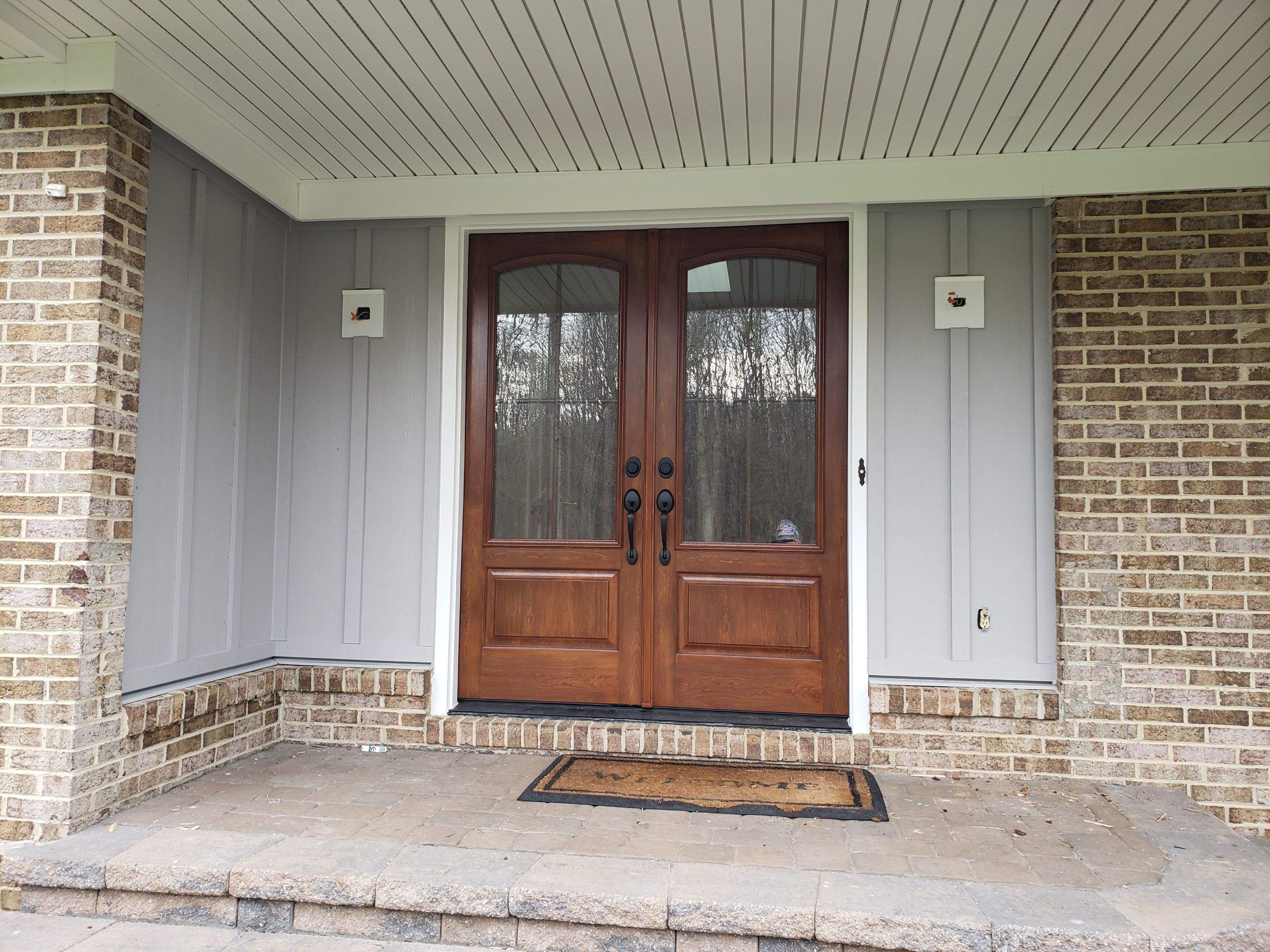 Roof, Siding, Door, and gutter replacement by American Home Contractors