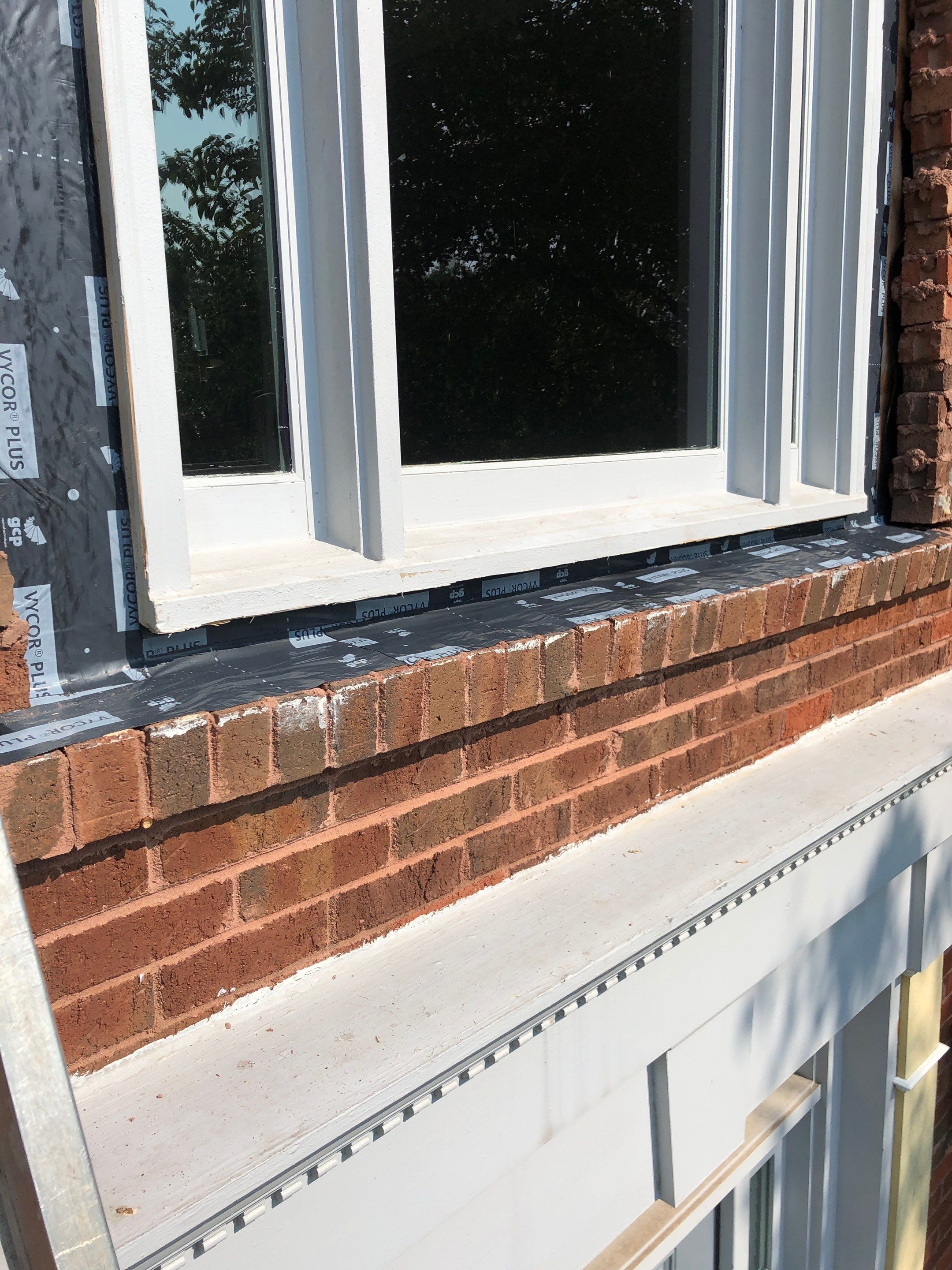 Exterior Painting and Trim Refresh for a Woodstock Brick Home by Swift Home Renovations