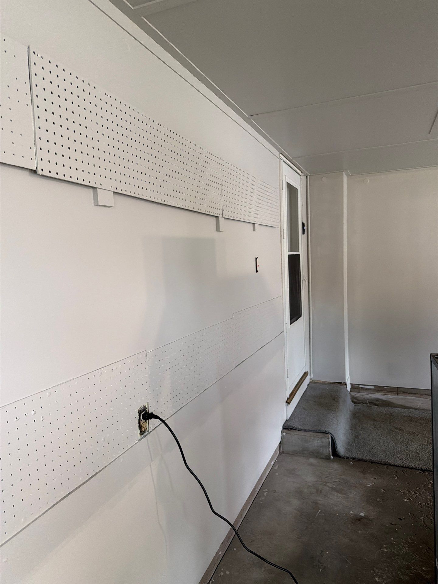 Muskegon Garage Interior Painting and Epoxy Flake Floor Installation by Gordon Painting
