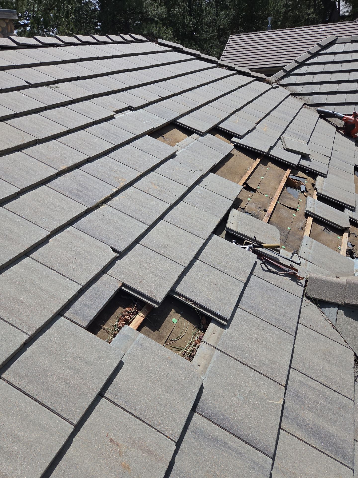 Tile Repair & New Gutters by RTP Roofing Company