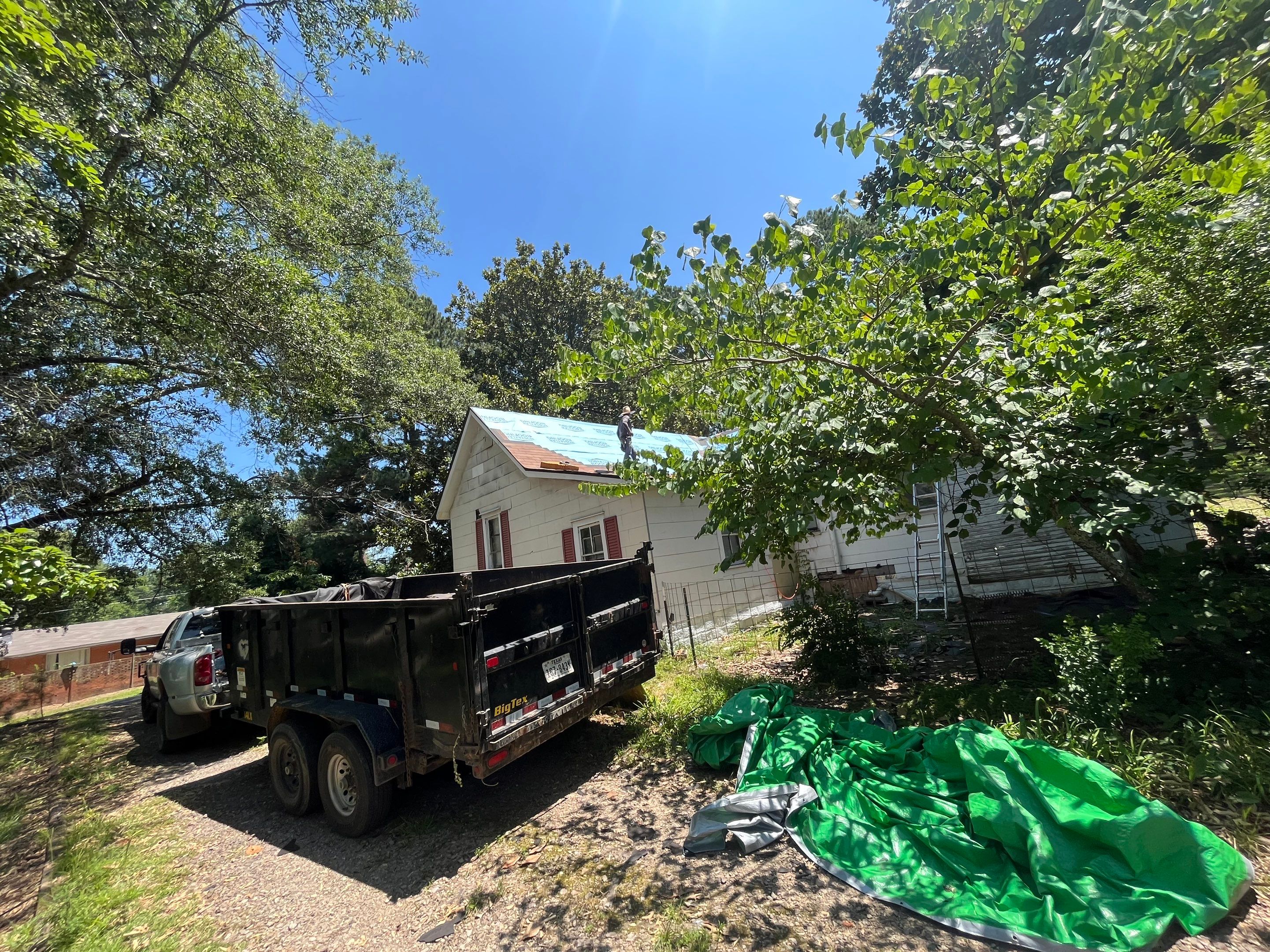 Storm Restoration Reroof: 25 Year 3-Tab Shingle by Hostetler Roofing