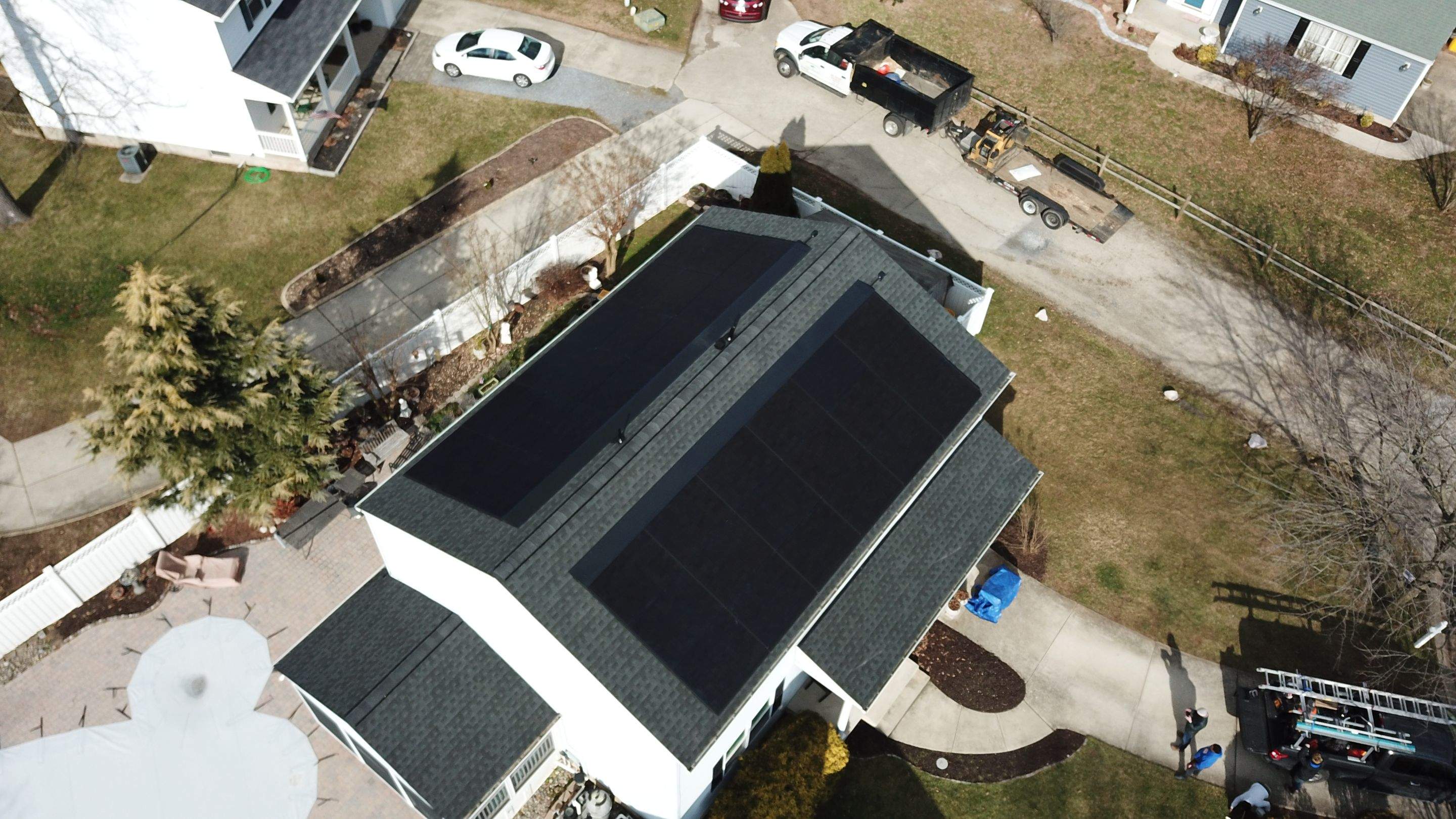 Roof Replacement with GAF Decotech integrated solar panels by American Home Contractors