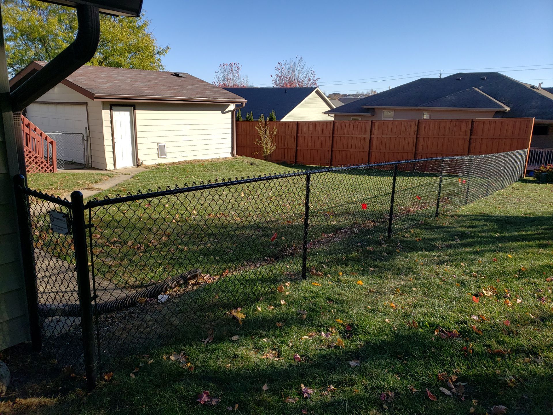 Black Chain Link Fence and Gate Installation in Cedar Falls by Perfect Picket Fence and Stain