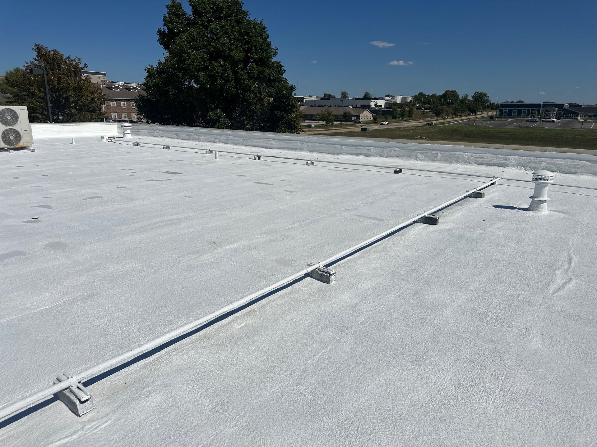 Commercial Roofing Install - SPF Foam & Coatings Restoration & EPDM System - Color White  by Titan Commercial & Residential Roofing 