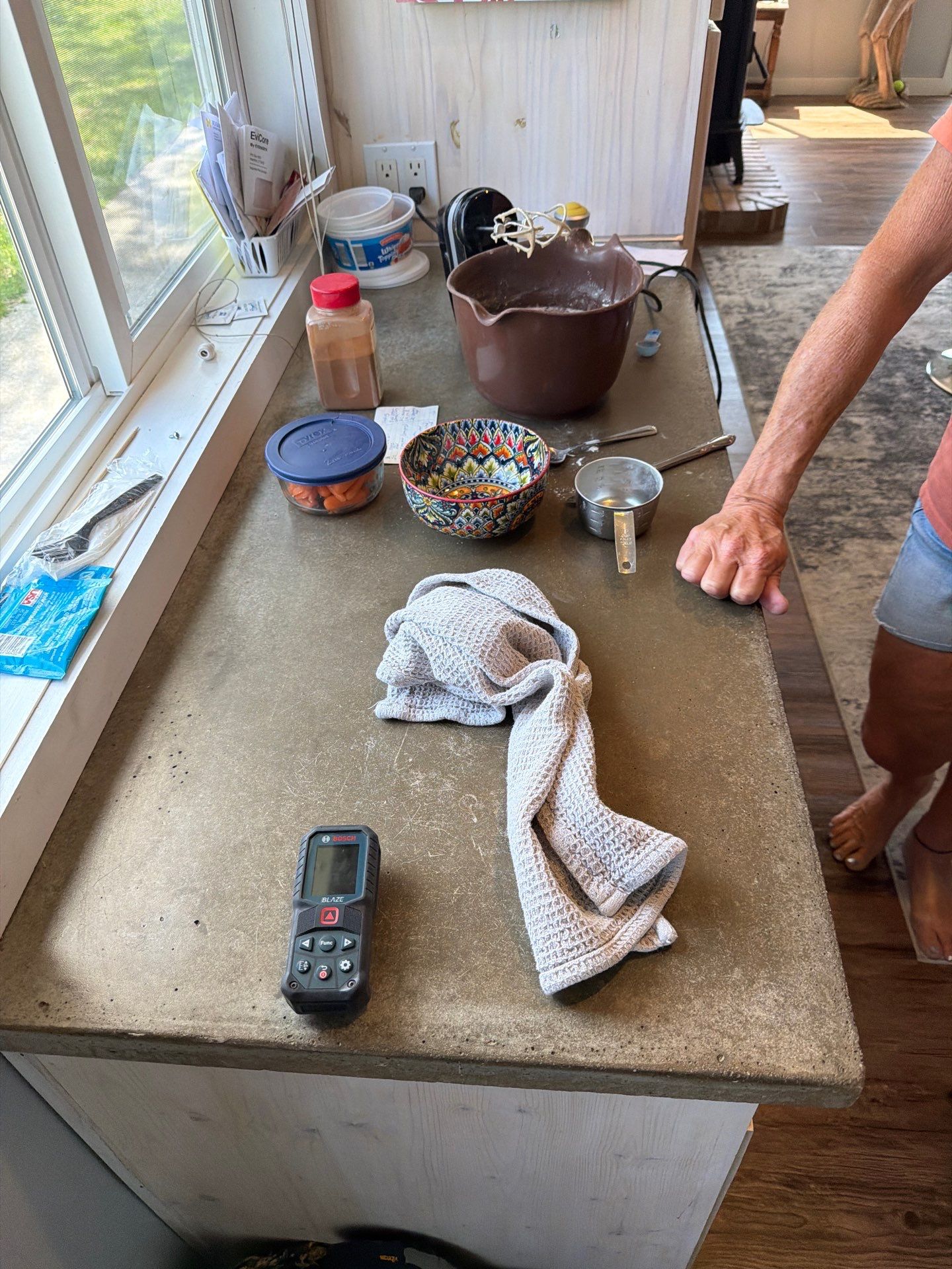 Custom Metallic Epoxy Floor and Polished Countertop Installation in Mears by Gordon Painting