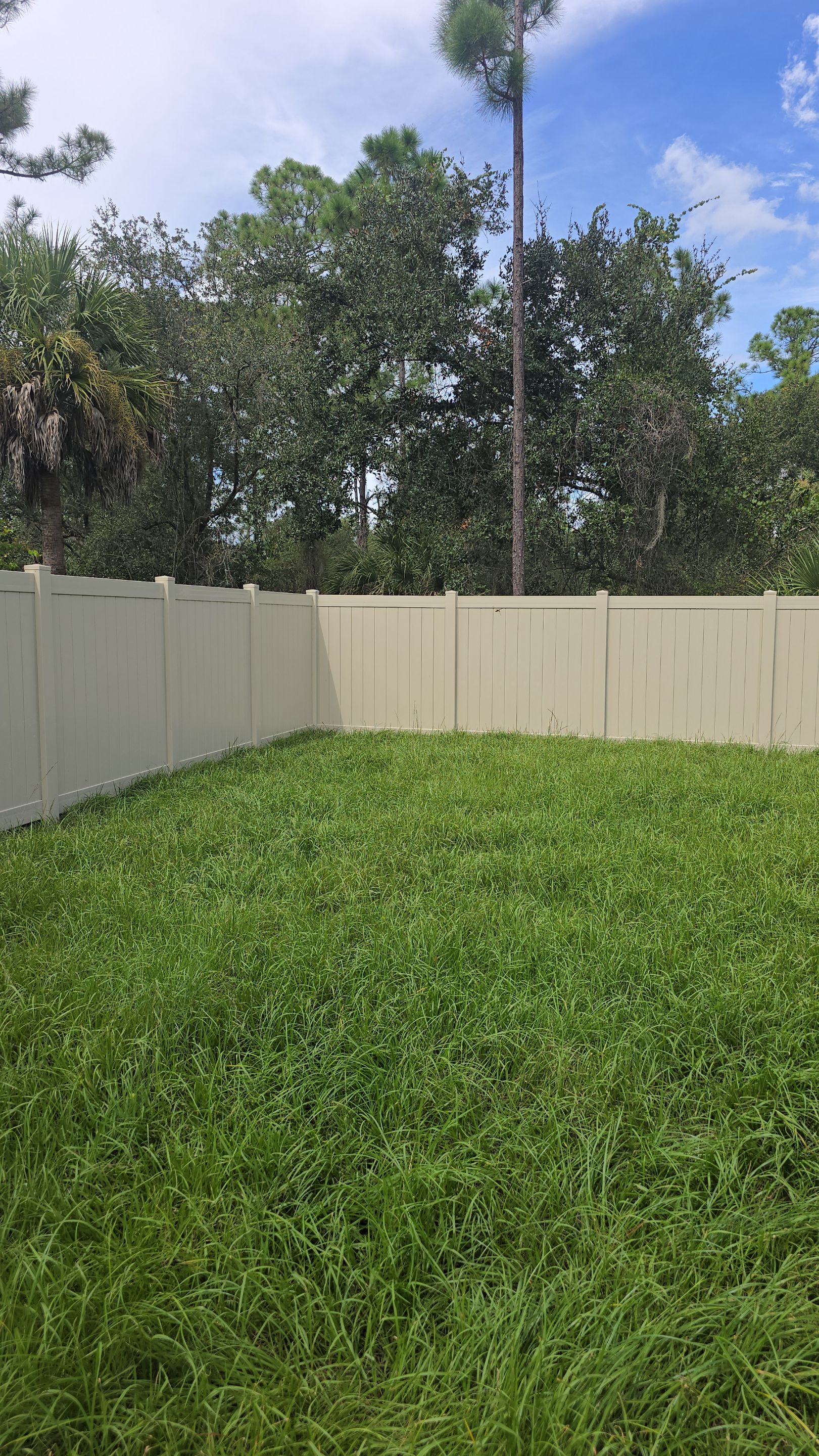 Tan Vinyl Privacy Fence and Gate Installation in Port Charlotte by True Fence LLC