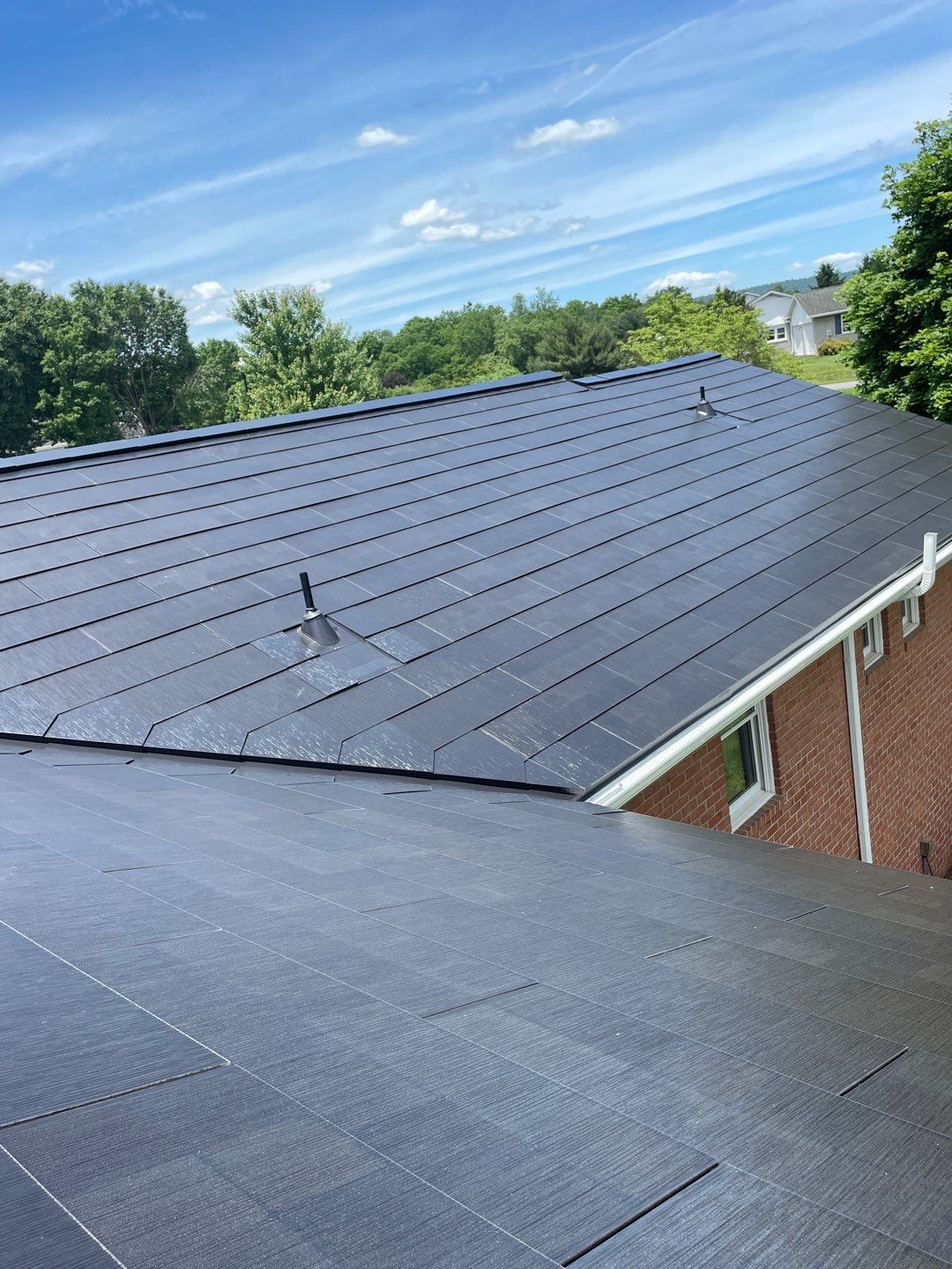 Tesla Solar Roof Installation by American Home Contractors