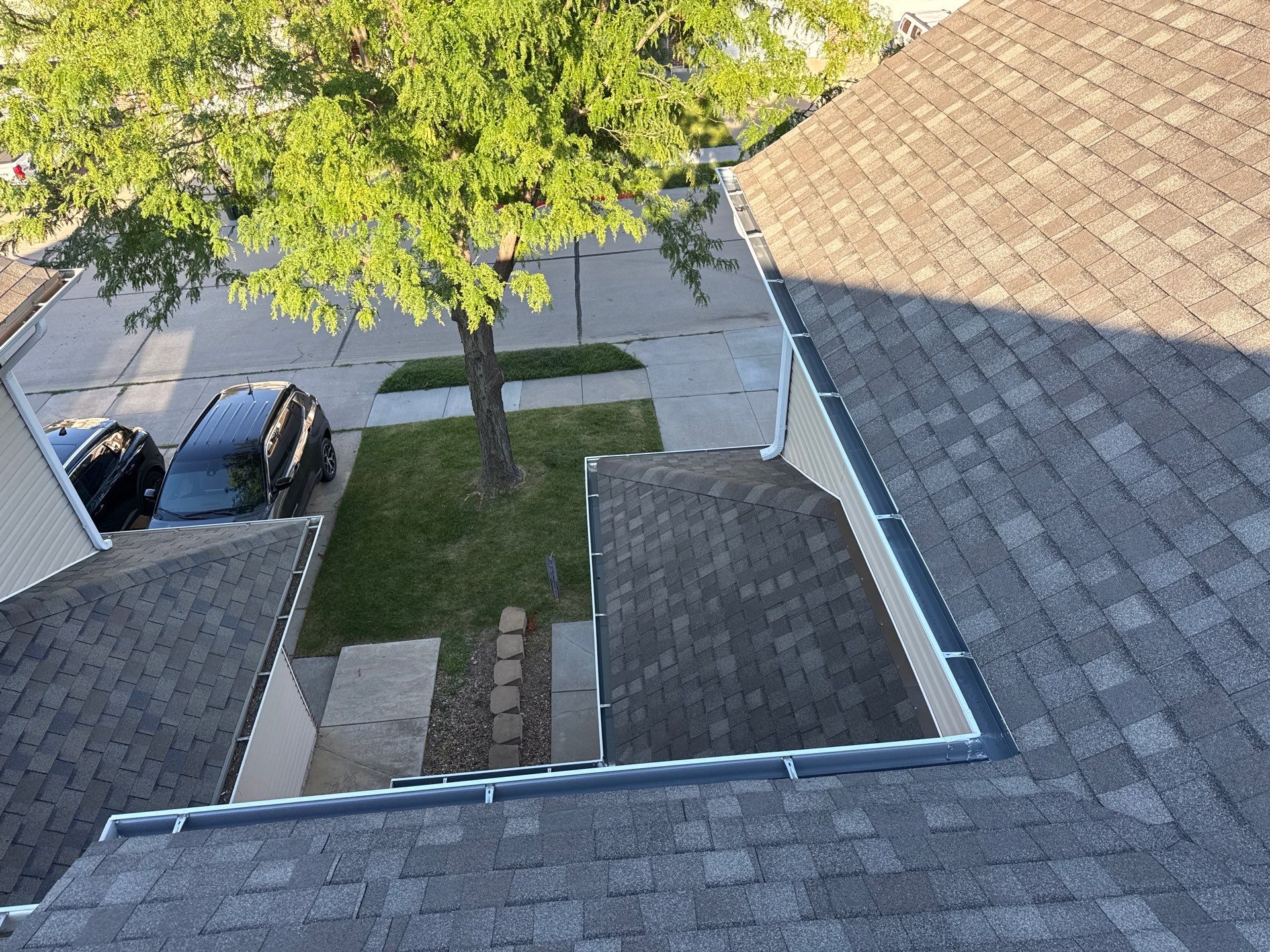 Residential Architectural Shingle Roof Replacement and Gutter Upgrade in Lincoln by Star Home