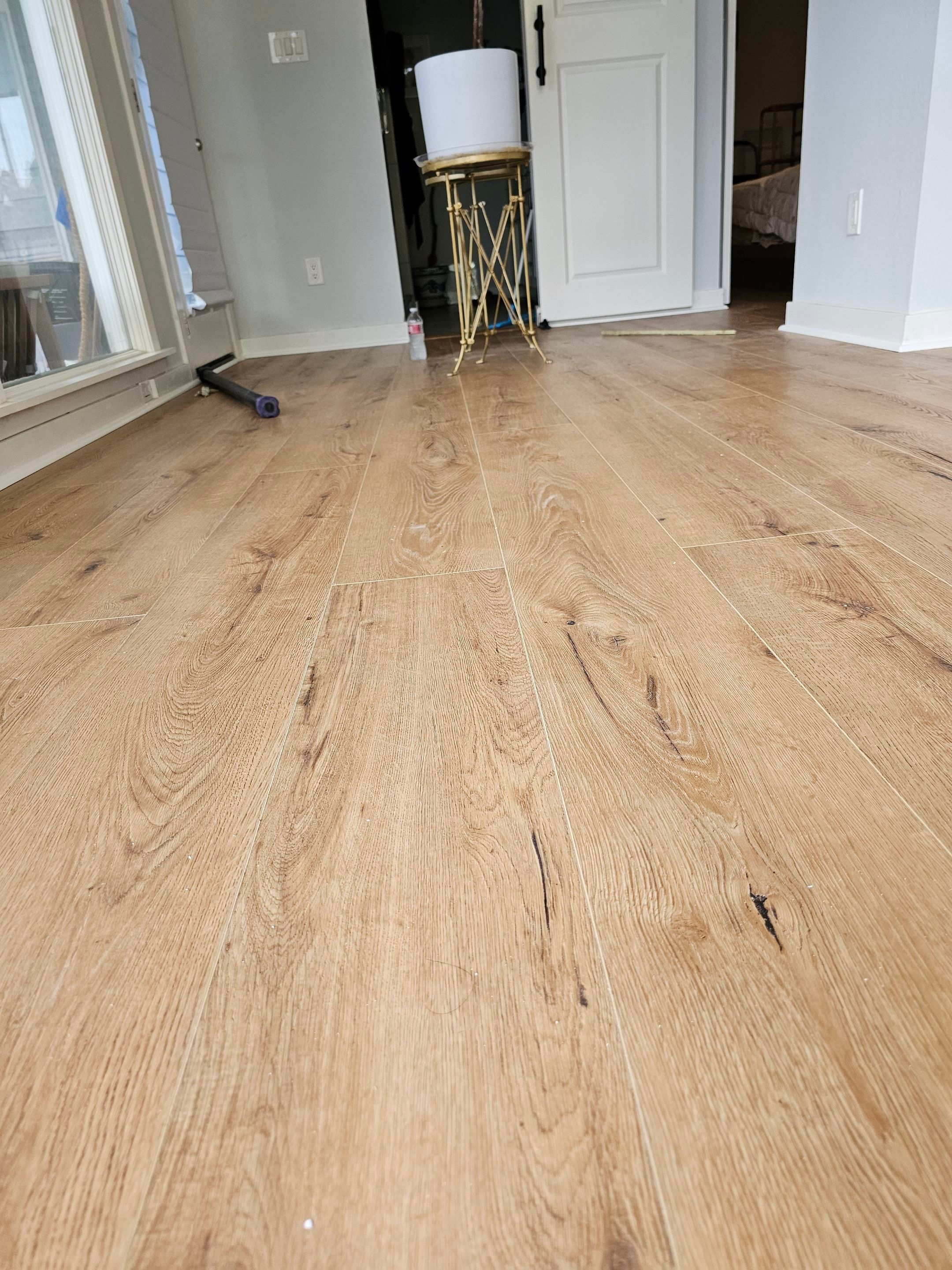 Laminate floor & fence by EL-GC LLC 