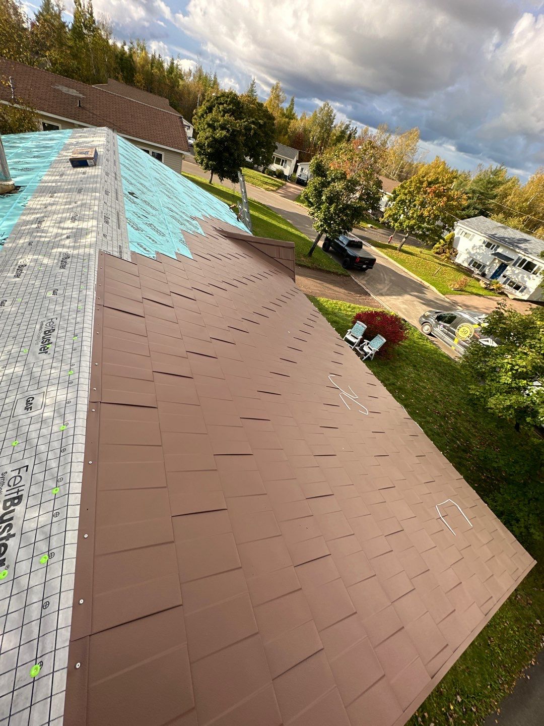 Residential Roofing Installation using Wakefield Bridge Steel Shingle by Ideal Steel by Artisan Roofing & Home Improvements Inc.