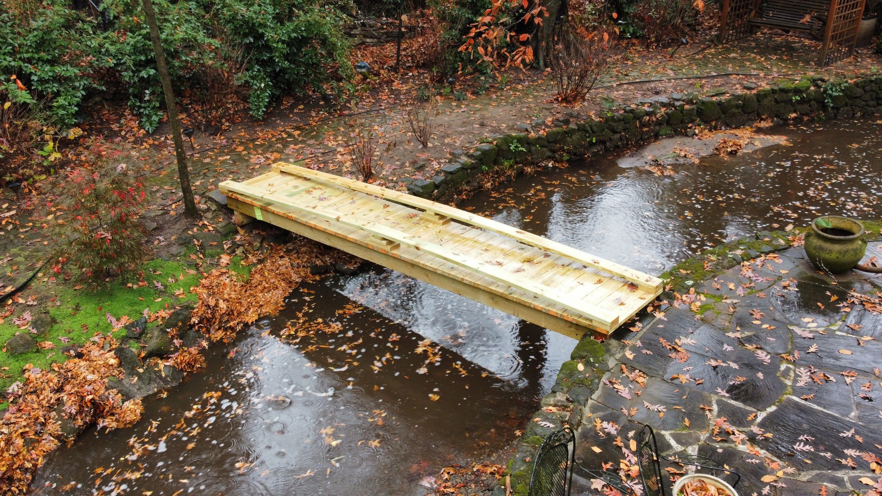 Pressure-Treated Wood Deck Replacement and Garden Bridge in Atlanta by Swift Home Renovations