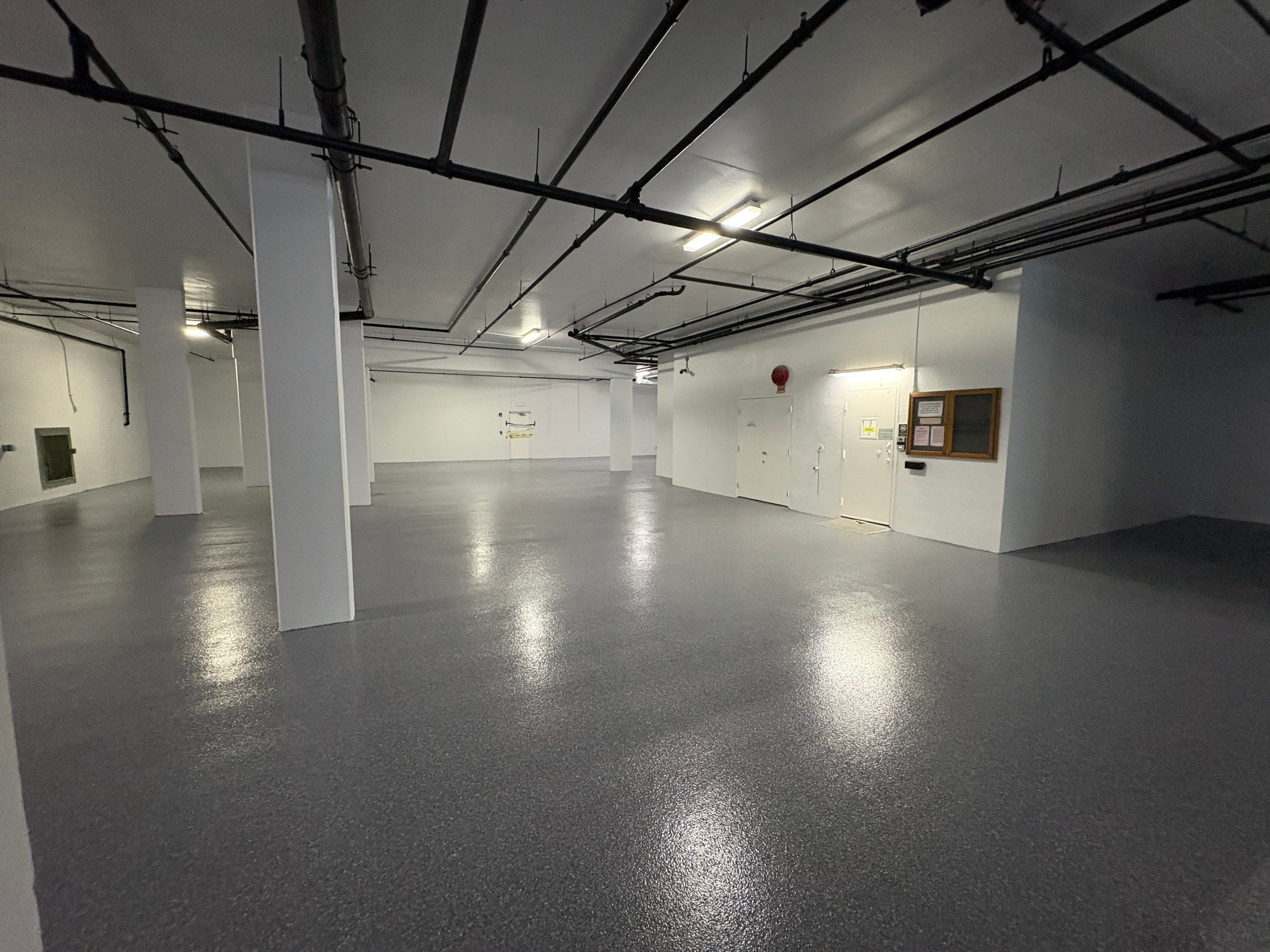 Durable Solid Color Warehouse Floor by Performance Floors & Coating
