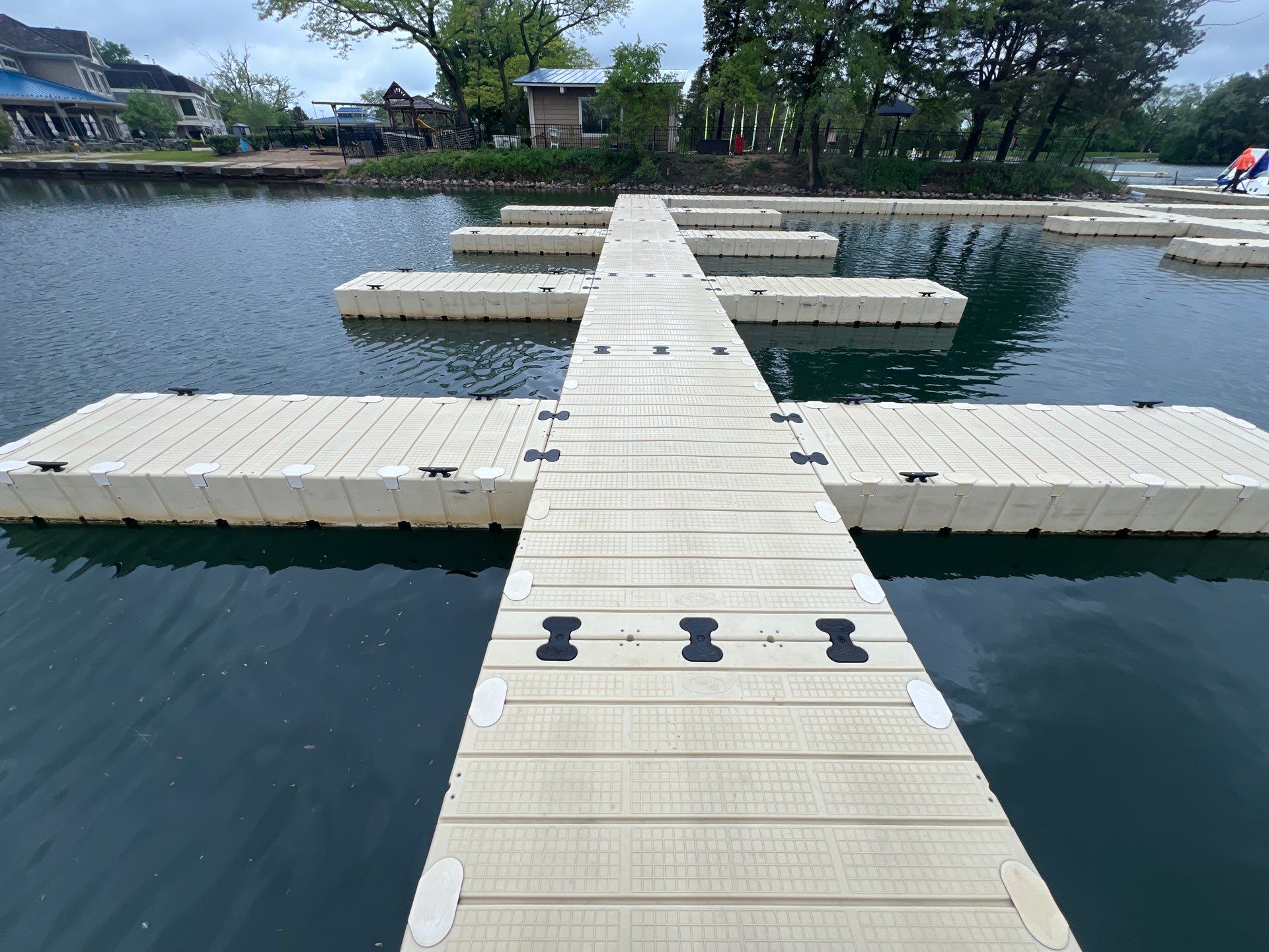 Power washing of floating dock by Northern Power Washing LLC.