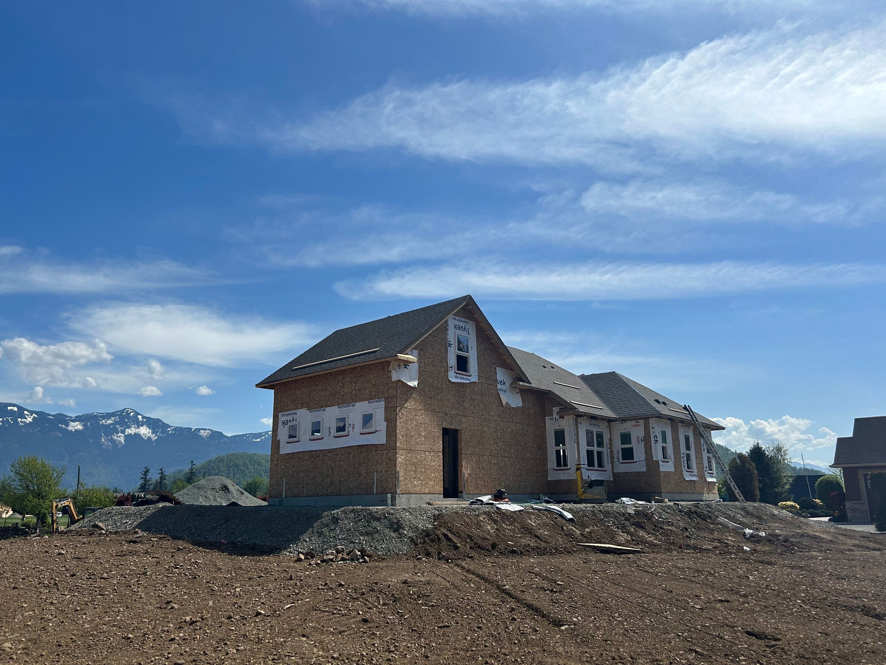 Residential Roofing Installation upgraded venting and hip and ridge capping by Top Notch Roofing Inc