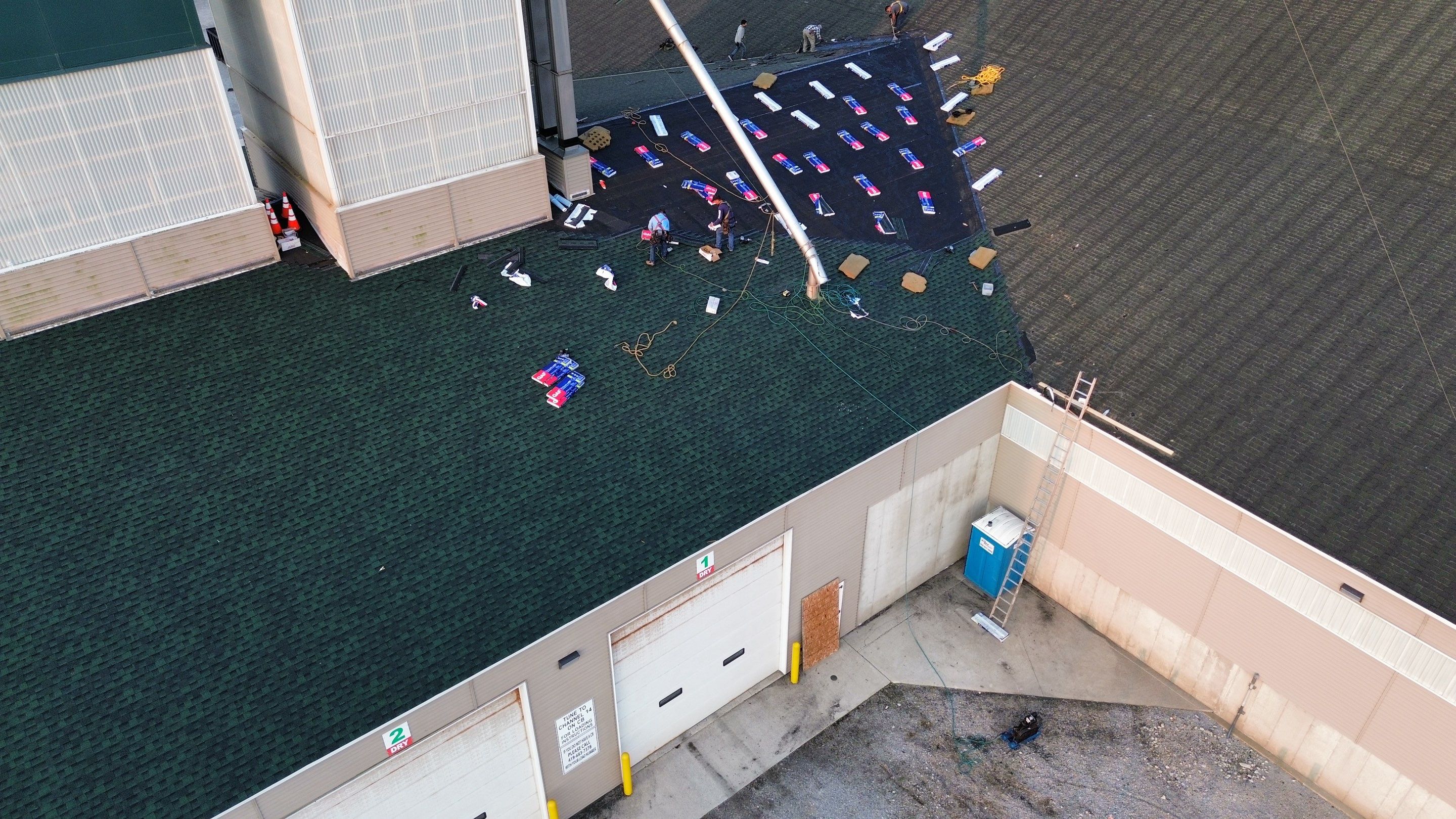 Commercial Roofing Installation using Timberline HDZ Shingles - Hunter Green by RoofX 
