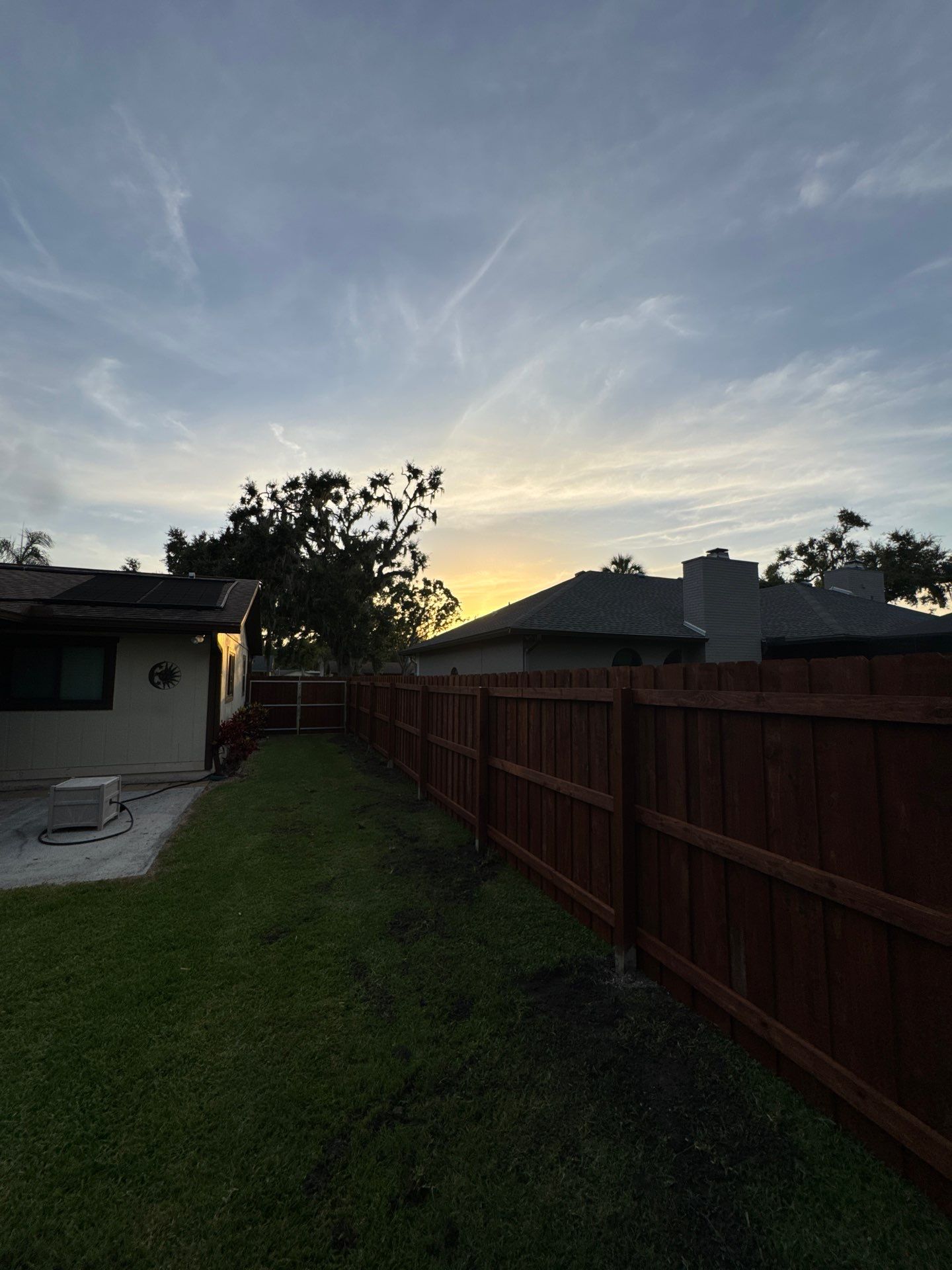 Wood Fence Installation using Pre-stained Pine Board On Board by Asap fence and gates, LLC